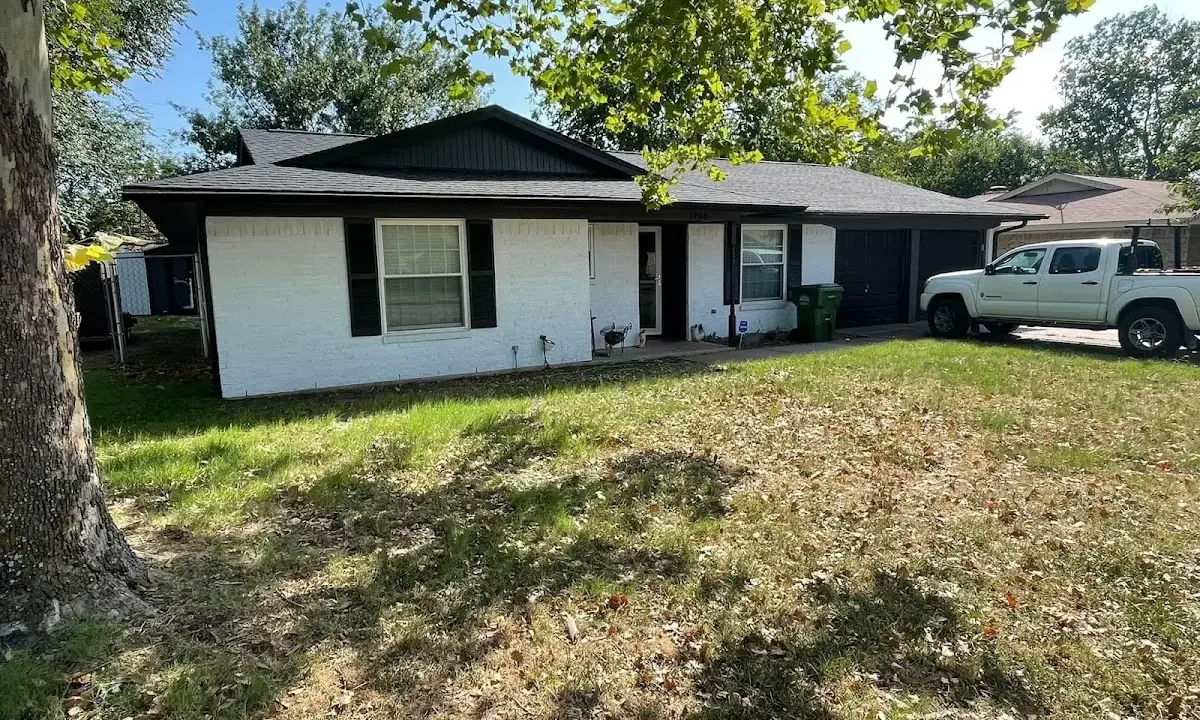 Professional roofing crew working on a residential roof in Rancho Murieta